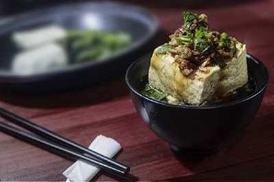 tofu topped with edible garnish