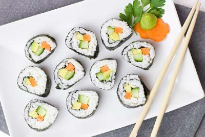 vegan sushi arranged on a plate