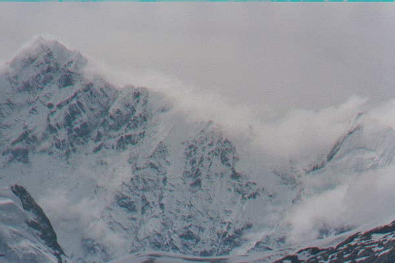 Fog creeping over Mountain in Alaska