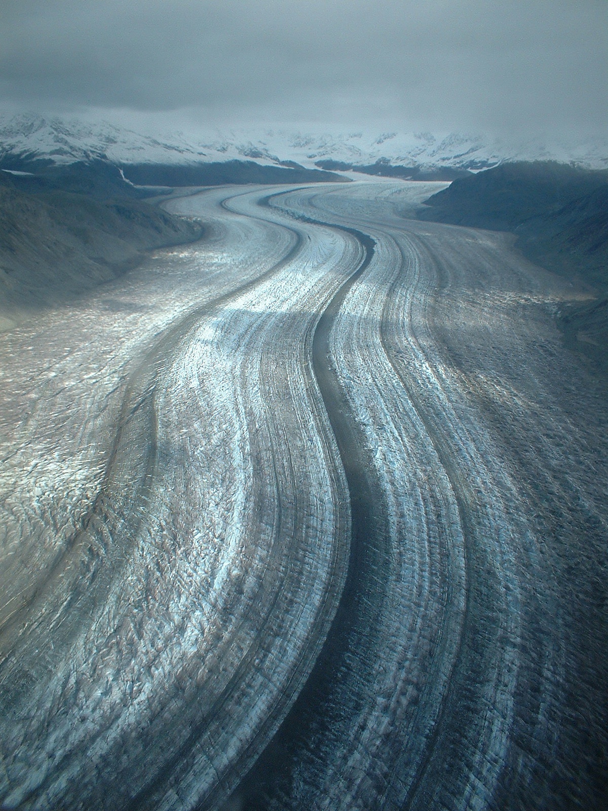 aerial in alaska of highway l;ike glacial field 