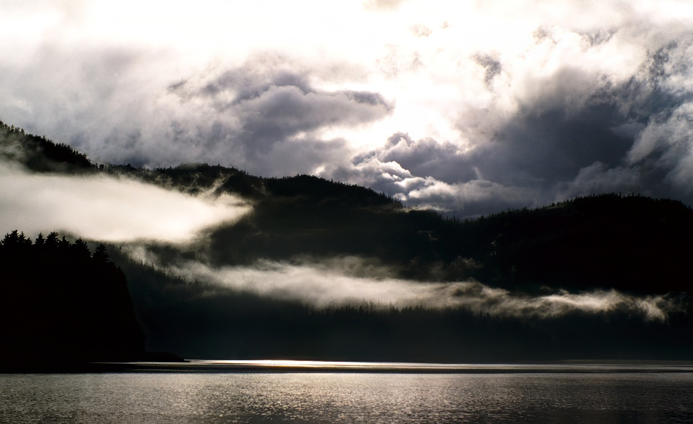 stormy clouds with black hill