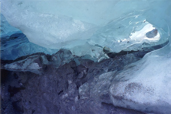 glowing light blue Ice Cave in Alaska