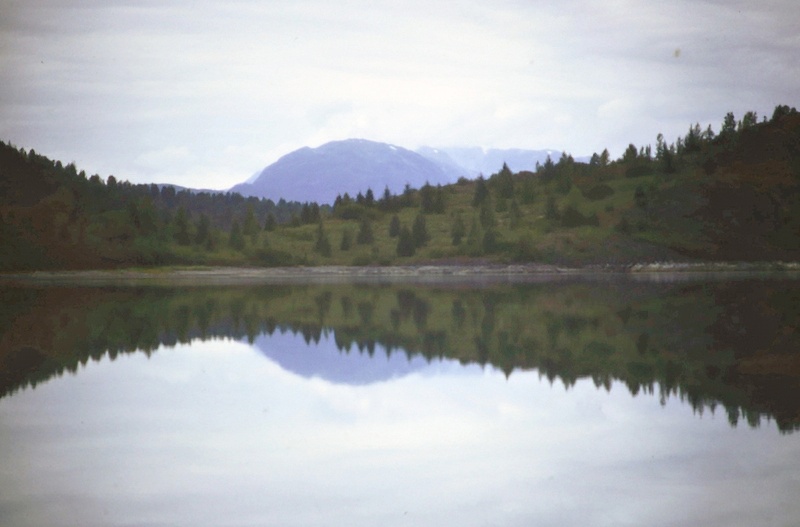 Moon like reflection of water and hill