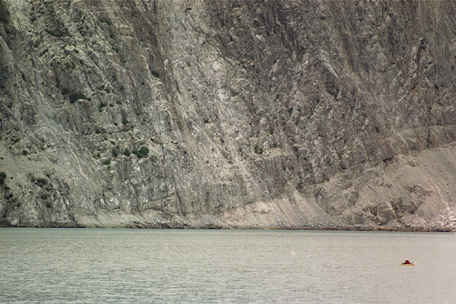 muir inlet rock wall and kayak