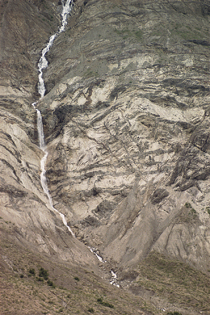 waterfall branching down a steep mountain side