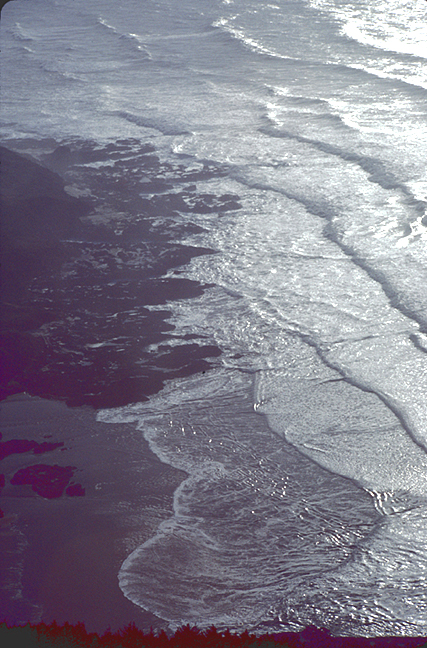 gray ocean waves from high above with six layors